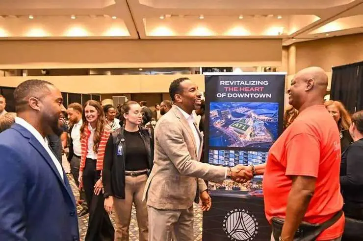 Mayor Dickens connects with a small-business owner at Showcase Atlanta