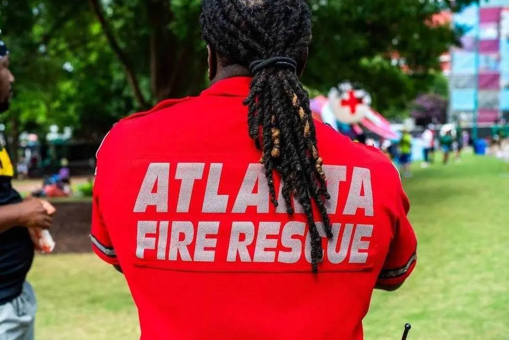 An Atlanta Fire Rescue staffer on duty at the Fan Festival